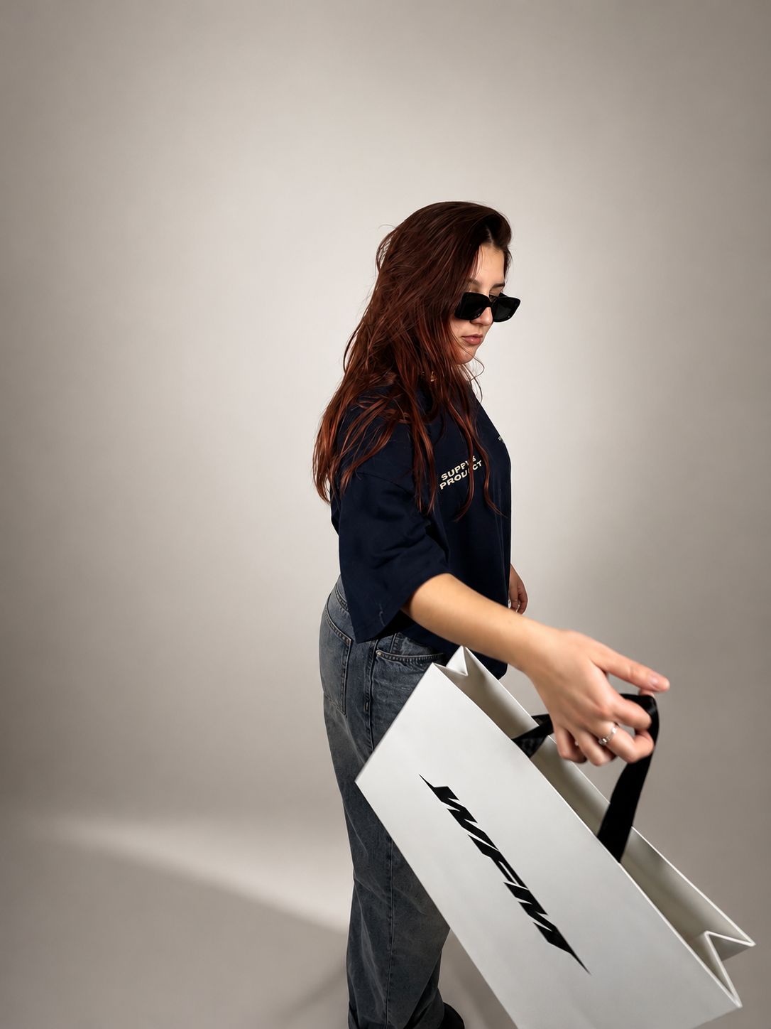 Look WFM SS26 — bolso de lado